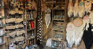 Christmas markets in the UK were once a great destination to find unique gifts from independent sellers - but now, they are more likely to sell 'overpriced tat' that can easily be found on Amazon, Temu and Etsy. Pictured, a stall at Leeds Christmas market
