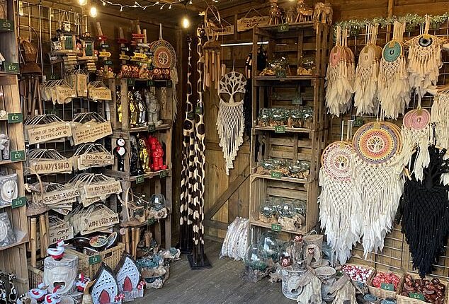 Christmas markets in the UK were once a great destination to find unique gifts from independent sellers - but now, they are more likely to sell 'overpriced tat' that can easily be found on Amazon, Temu and Etsy. Pictured, a stall at Leeds Christmas market