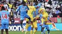 The ball flies over Benin defender Olivier Verdon's head before it appears to land on Democratic Republic of Congo captain Chancel Mbemba's arm late on in the match