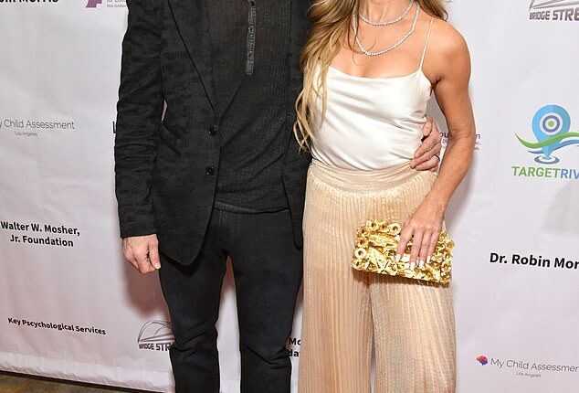 Denise Richards' estranged husband Aaron Phypers compared her to Rob Reiner's son Nick, when asked why she accused him of domestic violence; Phypers and Richards pictured in May