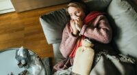 A family doctor has revealed exactly what you should do if you were exposed to the flu - as a severe variant of the illness is spreading rapidly across the United States (stock image)