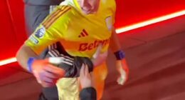 Aston Villa goalkeeper Emi Martinez reacted to Arsenal fans as he walked down the tunnel
