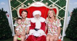 Emily Seebohm has clapped back after a troll slammed her for allowing her son, who she shares with her ex Ryan Gallagher, to sit on the lap of her new partner in a family Christmas photo with Santa. Pictured: Emily's son Sampson and her new boyfriend, Brandon Caust