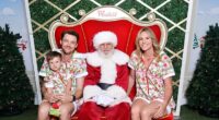 Emily Seebohm has clapped back after a troll slammed her for allowing her son, who she shares with her ex Ryan Gallagher, to sit on the lap of her new partner in a family Christmas photo with Santa. Pictured: Emily's son Sampson and her new boyfriend, Brandon Caust