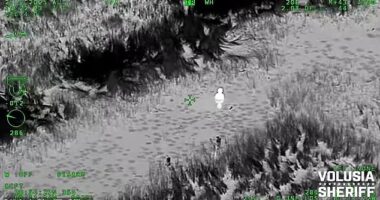 Incredible video footage captured the moment a police officer rescued a missing boy from a freezing pond and reunited him with his father in an emotional scene