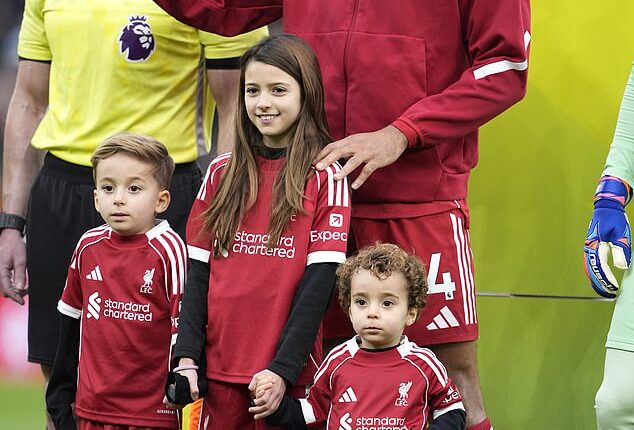 Diogo Jota's sons - Dinis and Duarte - led Liverpool out at Anfield alongside captain Virgil van Dijk