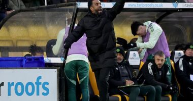 Nancy tries to cajole his players from the touchline amid the chaos of the Livingston game