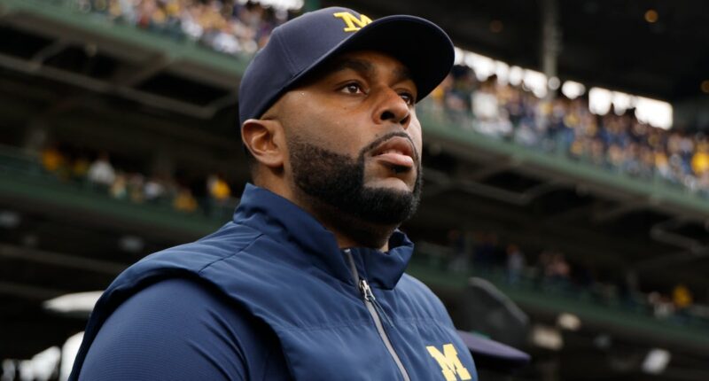 Fired Michigan football coach Sherrone Moore charged with home invasion and stalking