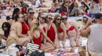 Dozens of Aussies flocked to the beach for Christmas festivities on Thursday