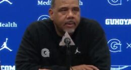 Georgetown has suspended coach Ed Cooley one game after he hit a child with a water bottle