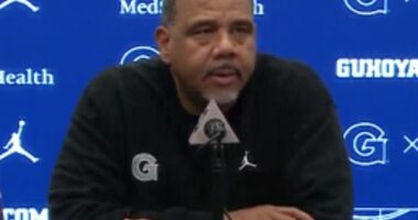 Georgetown has suspended coach Ed Cooley one game after he hit a child with a water bottle