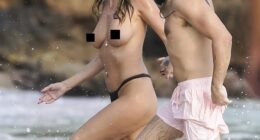 Heidi Klum brought the holiday heat as she went topless for a day in paradise on Friday