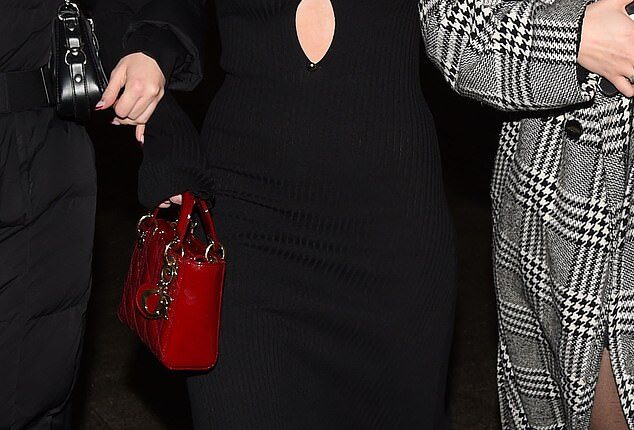 Helen Flanagan turned heads in a racy plunging dress while enjoying a girls night out in Liverpool on Saturday, after she emotionally shared her co-parenting Christmas woes