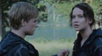 Peeta (Josh Hutcherson) and Katniss (Jennifer Lawrence) at the end of The Hunger Games.