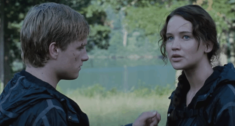 Peeta (Josh Hutcherson) and Katniss (Jennifer Lawrence) at the end of The Hunger Games.