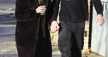Holly Ramsay and Adam Peaty held hands as they joined her family on a Christmas morning walk - as his estranged mother and father stepped out alone two days before their big A-list wedding