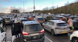 Motorists stuck in lines of traffic waiting to board Le Shuttle trains at Folkestone in Kent today