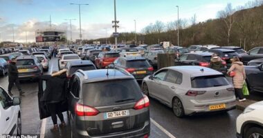 Motorists stuck in lines of traffic waiting to board Le Shuttle trains at Folkestone in Kent today