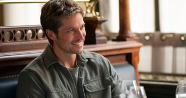 Emily in Paris. (L to R) Lily Collins as Emily, Lucas Bravo as Gabriel in Emily in Paris