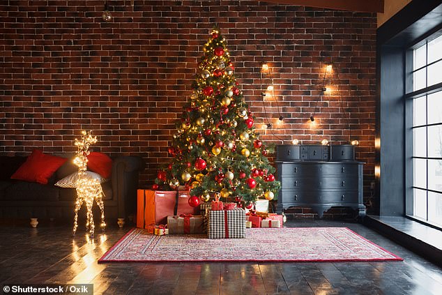 Is your Christmas tree making you look classy or common? Experts tell the Daily Mail that the more traditional your decor is, the more dated it looks (stock image)