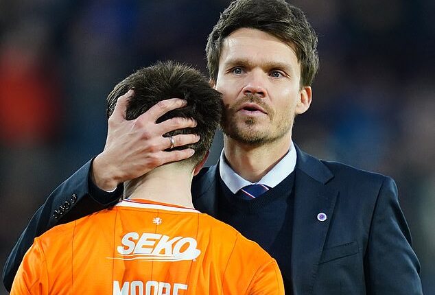 Rohl commiserates with his players after Tynecastle loss but he is not giving up on title