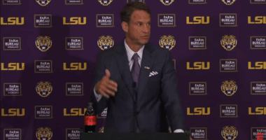 Lane Kiffin speaking at a presser.