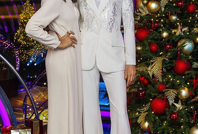 Claudia wears a vintage cream midi from Reloved Again for Strictly¿s Christmas Day Special, while Tess waltzes off in a £590 trouser-suit by Nadine Merabi