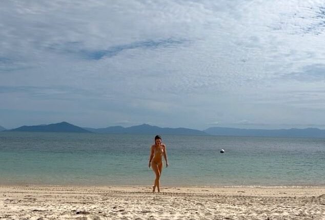 Lily James stunned in a bikini on Sunday as she reflected on an idyllic island break in Australia that 'healed and restored' her after a busy work year