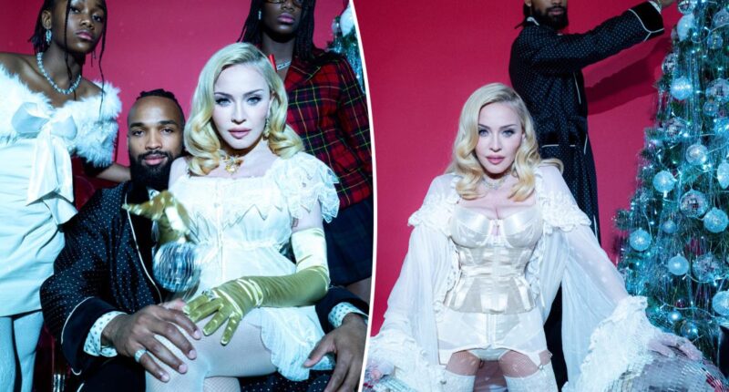 Madonna poses for Christmas lingerie photo shoot with daughters, boyfriend