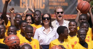 Prince Harry and Meghan's Archewell charity incurred unprecedented expenses in 2024. Some of that amount could be attributed to the couple's quasi-royal tours of Nigeria and Colombia. Pictured: The couple at the Dream Big Basketball Clinic in Lagos, Nigeria in May 2024