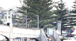 The previously unseen footage from the attack showed two men, a child, a teenage boy, and a woman cowering on a set of steps leading up to a footbridge, where suspected the terrorist shooters allegedly opened fire on people celebrating Hanukkah