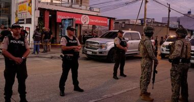 Police and army surround the place where Mario Pineida was killed on Wednesday