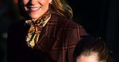 Kate beamed a wide smile as she arrived at Sandringham with Princess Charlotte, 10