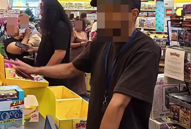 In a video now amassing more than 1.6 million views, one eager father has been publicly shamed, wrongly accused and humiliated in front of other shoppers at a festive charity drive organised by  well-known reality TV star and one of Australia's strongest men, Jaden Laing