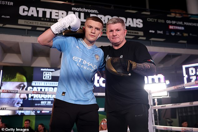 Ricky (right) with his son Campbell Hatton (left) during his public workout at the National Football Museum on October 17, 2024