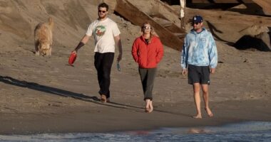Rob Reiner's son Jake, pictured far R, enjoyed a soothing sunset beach walk with his girlfriend Maria Gilfillan and his sister Romy's boyfriend, Alex Silberberg, in Southern California on Sunday