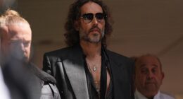 Russell Brand pictured leaving Southwark Crown Court in May after he pleaded not guilty to five charges relating to alleged sex attacks on four women