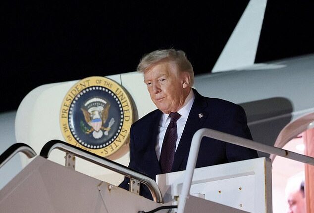 President Donald Trump remained silent about the release of thousands of photos related to convicted pedophile Jeffery Epstein while speaking at a Friday night rally. Pictured: Trump getting off a plane at West Palm Beach International Airport to head to his Mar-a-Lago resort