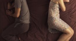 Partners face away with a gap between them: This can signal healthy independence – or resentment. If this isn’t a normal sleep position, it may be because there is an unspoken tension