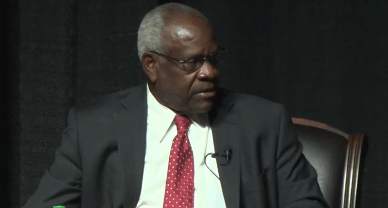 Clarence Thomas speaking at an event.