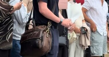 The moment an Aussie man's tribute to the Bondi massacre victims brought tears to mourners' eyes has been caught on camera (Pictured: Matthew Hayes)