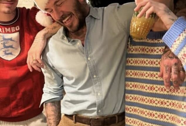 David Beckham and his sons Romeo and Cruz looked jolly as they donned Santa hats ahead of Christmas- as Brooklyn remains estranged from the family