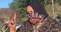 A headscarf-wearing woman scolded a journalist for asking her if she is running a daycare out her Washington home