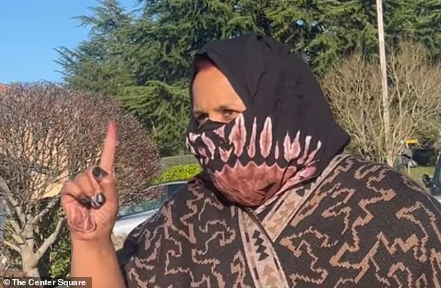 A headscarf-wearing woman scolded a journalist for asking her if she is running a daycare out her Washington home