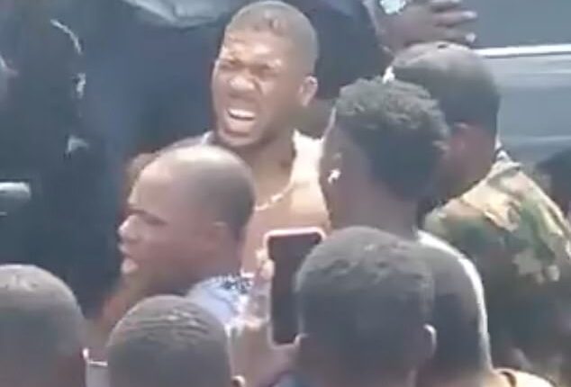 Anthony Joshua (pictured after crash) was discharged from hospital late on New Year's Eve