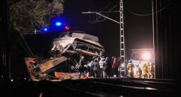 Emergency crews respond after a commuter train derailed when a retaining wall collapsed onto the tracks in Gelida, near Barcelona, Spain, on Tuesaday