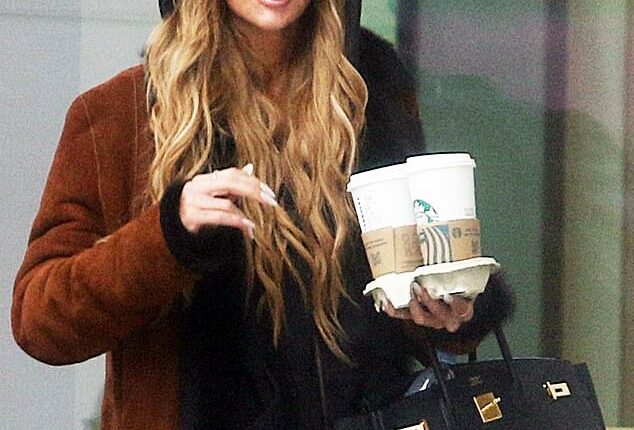 Olivia Attwood was spotted arriving for her KISS FM radio show without her wedding ring on Sunday afternoon, hours after it was revealed she has reportedly split from her husband Bradley Dack