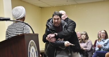 Ilhan Omar was attacked by a man who yelled that she 'should resign' before using a syringe to spray an unknown liquid at the Minnesota Congresswoman