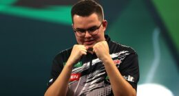 Netherlands' Gian van Veen celebrates after winning his match against England's Luke Humphries on day eighteen of the Paddy Power World Darts Championship at the Alexandra Palace, London. Picture date: Thursday January 1, 2026. PA Photo. Photo credit should read: Steven Paston/PA Wire.RESTRICTIONS: Use subject to restrictions. Editorial use only, no commercial use without prior consent from rights holder.