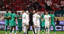 AFCON final descends into CHAOS as Senegal boss calls his team off the pitch after controversial late penalty is awarded to Morocco by VAR